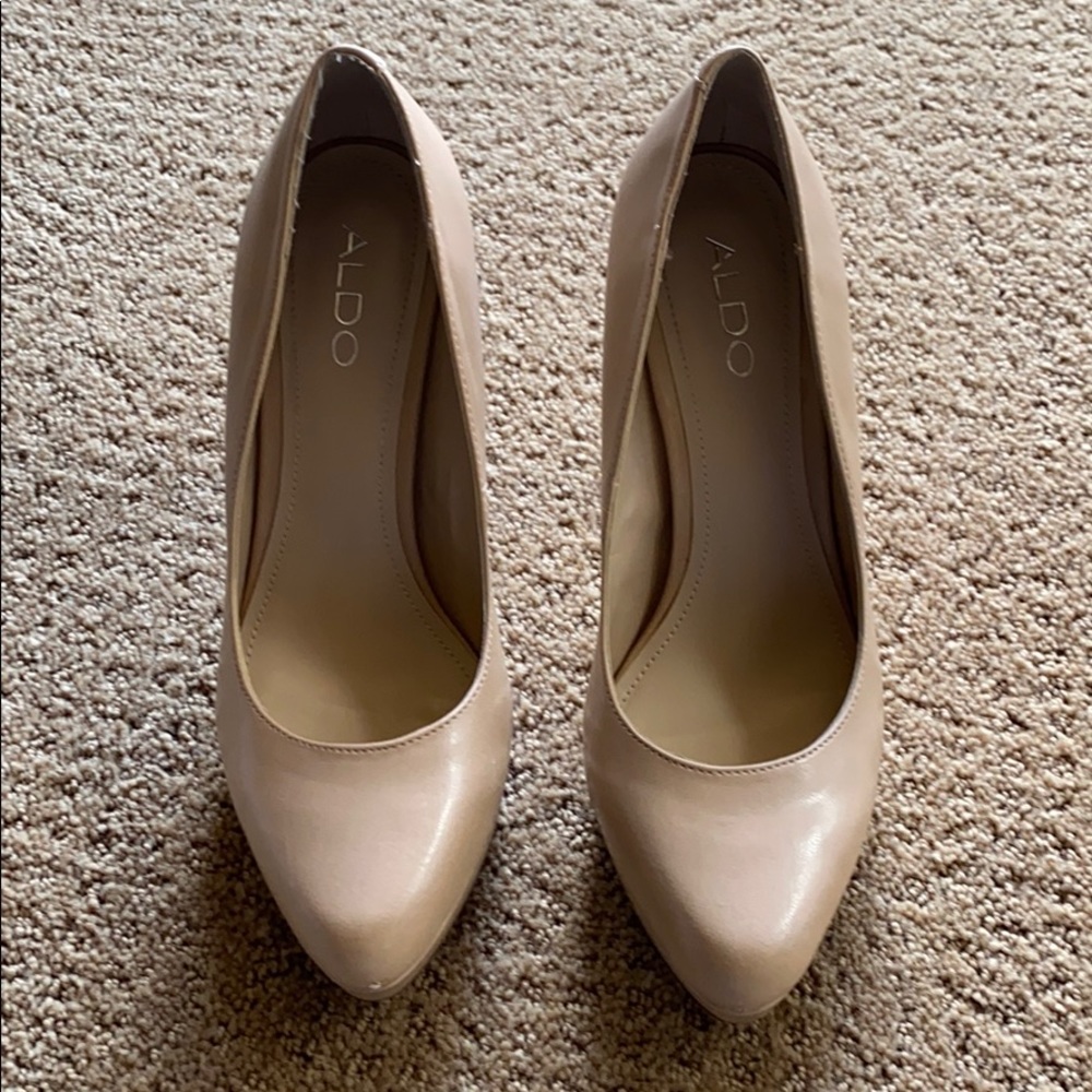 Tan Aldo high heels.